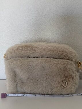 lululemon athletica Beige Faux Fur Crossbody Bag with Gold Hardware